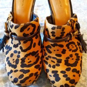 Fantastic Coach leopard print fabric and leather clogs